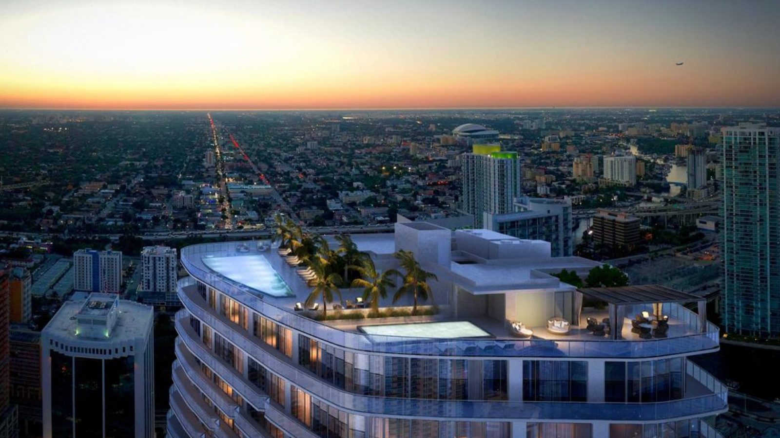 SLS Lux Brickell: la azotea con piscina, sobre Brickell al atardecer.